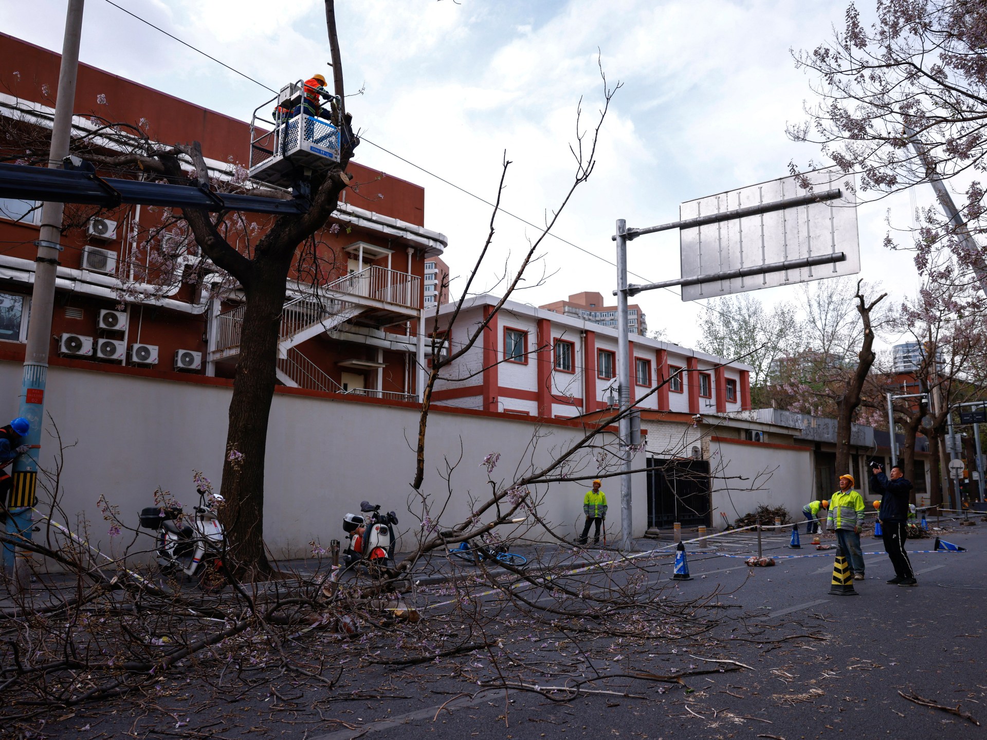 Flights cancelled, millions told to stay indoors as strong winds lash China | Weather News