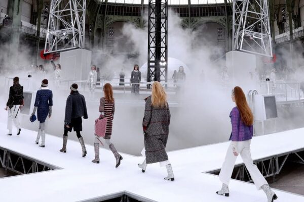 Who will host the first fashion show in space?