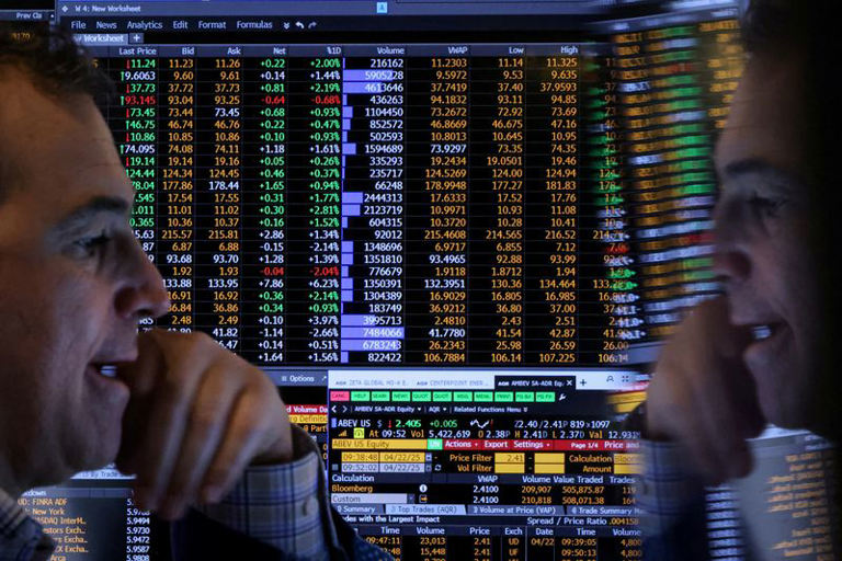 Wall Street ends higher on earnings, hopes of easing tariff tensions