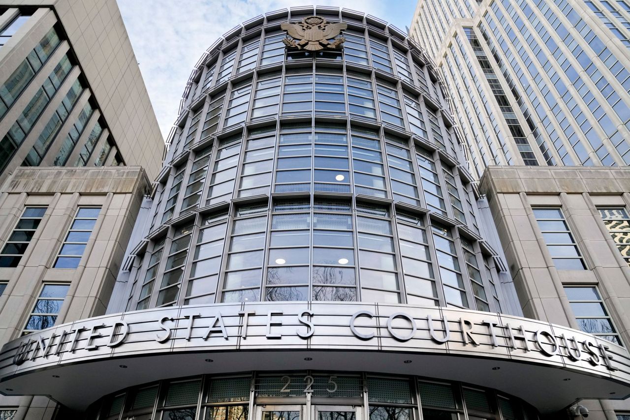 Scholar spared prison in US case alleging China spies on dissidents abroad
