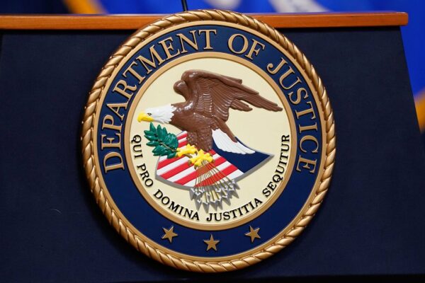 The seal for the United States Department of Justice. (AP Photo/Evan Vucci)