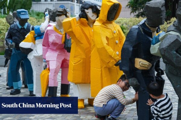 Hong Kong sculpture with yellow raincoats won’t return outside Cultural Centre