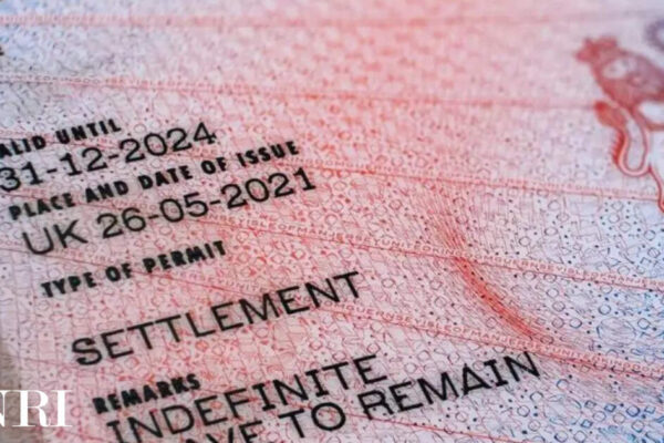 UK plans stricter rules for migrants seeking permanent residency