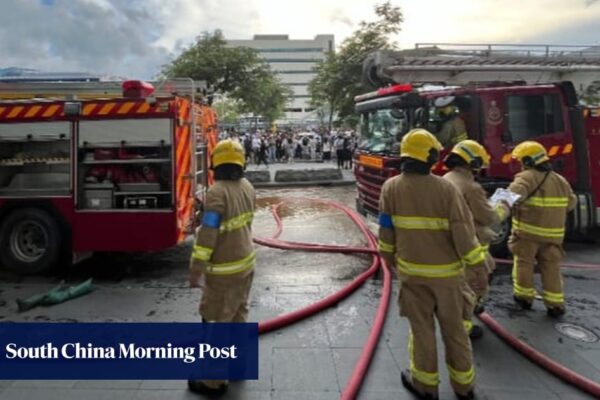 Workers flee as thick smoke spews from Cathay flight simulator in Hong Kong