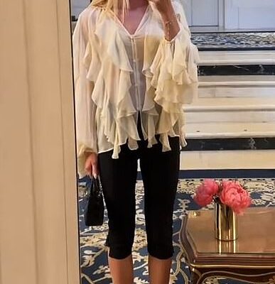 Brigette Pheloung, 27, wore a white ruffled blouse, black Capris and strappy black heels while getting cocktails at the hotel's Bar Hemingway