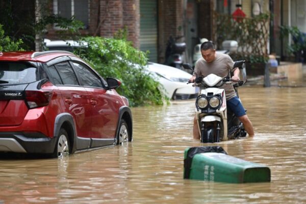 Thousands evacuated as heavy flooding sweeps through southern China