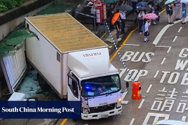 Hong Kong woman, 51, dies after being trapped under truck in bus stop crash