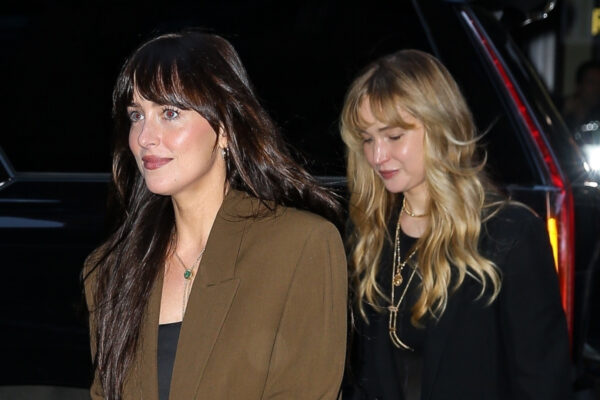 Dakota Johnson joins Jennifer Lawrence in New York with The Row bags in hand.