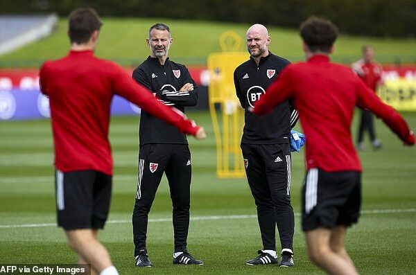 Liverpool make shock appointment of former Wales boss as U21 manager as Premier League champions overhaul their youth set-up Liverpool have appointed former Wales manager Rob Page (right) as their new Under-21 boss