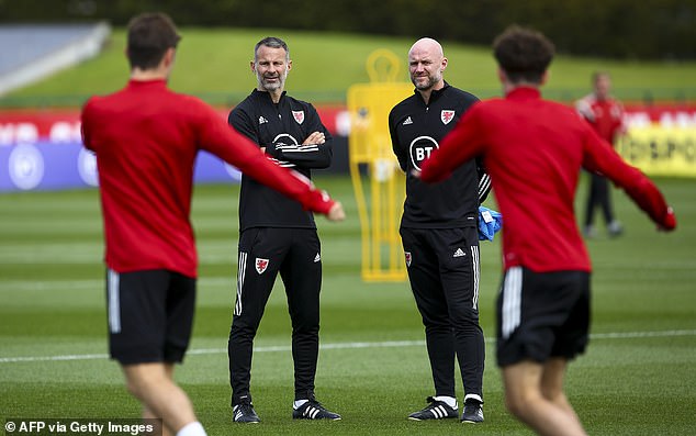 Liverpool have appointed former Wales manager Rob Page (right) as their new Under-21 boss