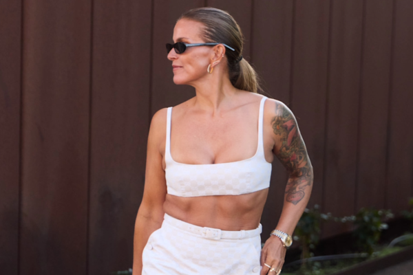 woman wearing a white bra top and a white pencil skirt