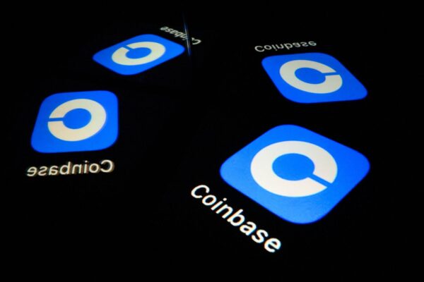 Coinbase Stock Surges, Credit-Card Shares Retreat