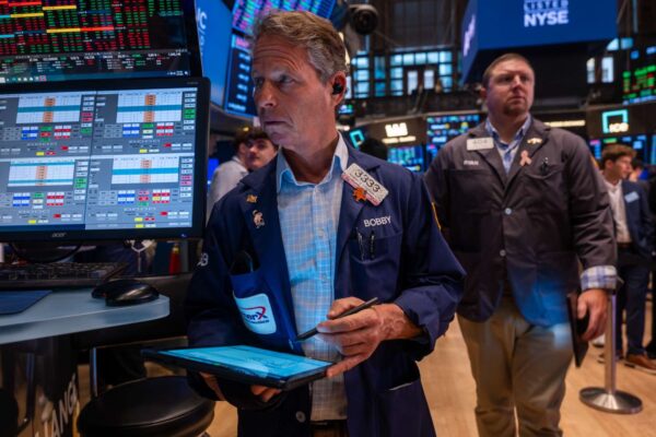 Stocks Close Little Changed After Fed Holds Rates Steady as Investors Monitor News on Israel-Iran Conflict