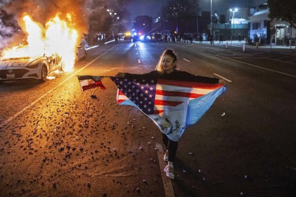 Why does the US still have a Level 1 travel advisory warning despite the chaos?