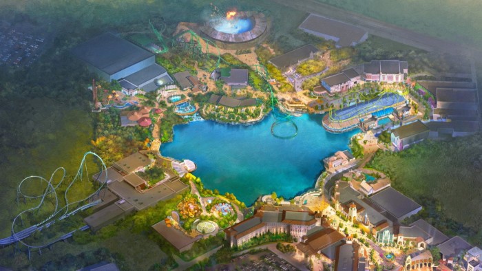 An artist's rendering of the Universal theme park near Bedford. The image shows a large, vibrant theme park with various attractions, including roller coasters, buildings and a central lake