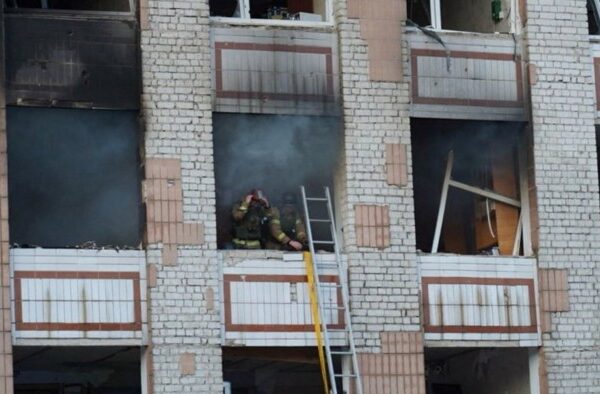 Firefighters working at a site of a Russian attack in the city of Smila, Cherkasy
