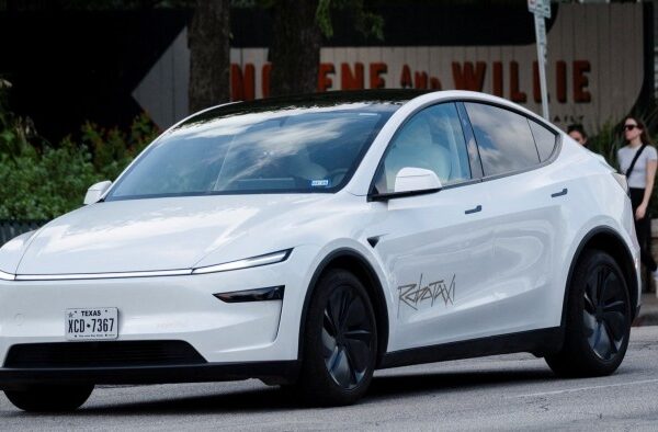 A Tesla robotaxi drives along South Congress avenue in Austin, Texas on June 22