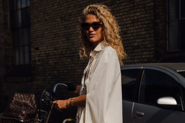 woman wearing an all-white outfit in copenahgen