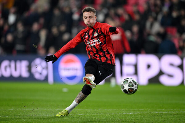 EINDHOVEN, NETHERLANDS - MARCH 04: Noa Lang of PSV Eindhoven shoots during the warm up prior to the UEFA Champions League 2024/25 UEFA Champions League 2024/25 Round of 16 first leg match between PSV and Arsenal FC at PSV Stadion on March 04, 2025 in Eindhoven, Netherlands. (Photo by Justin Setterfield/Getty Images)