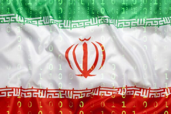Binary code with Iran flag, data protection concept - stock photo