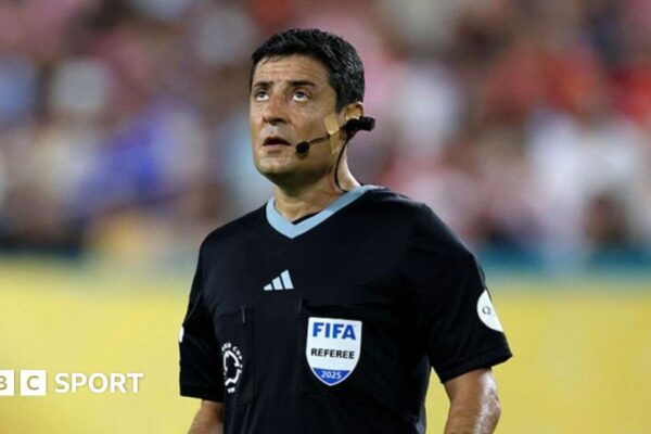 A referee wearing a body cam and microphone at the Club World Cup