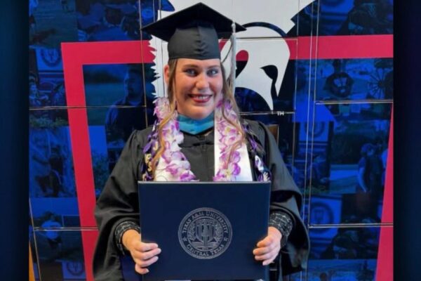 A custodian earns 4 degrees and a mailman rescues his favorite dog