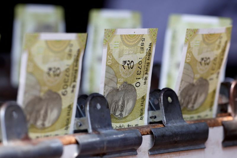 Rupee set to deepen losses as India braces for higher US tariffs
