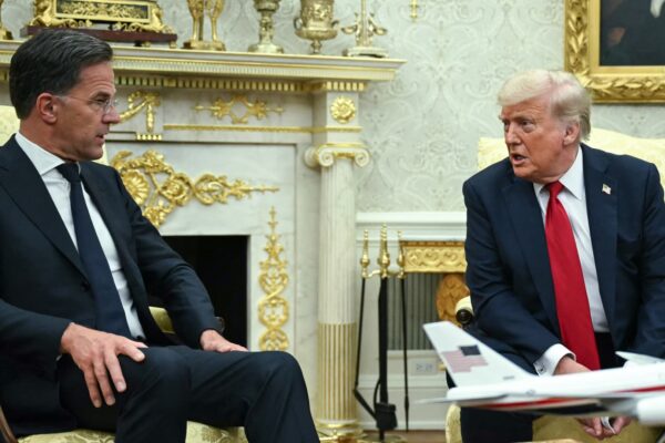 Trump brandishes tariffs for peace, not a trade war
