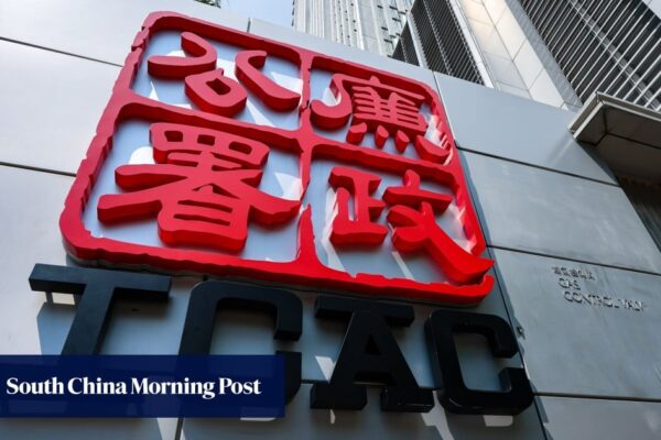 Ex-chairman of Hong Kong-listed Neo-China surrenders after 13 years on the run Ex-chairman of Hong Kong-listed Neo-China surrenders after 13 years on the run