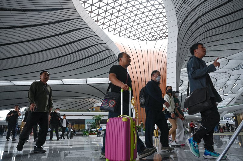 China loosens visa rules to boost tourism