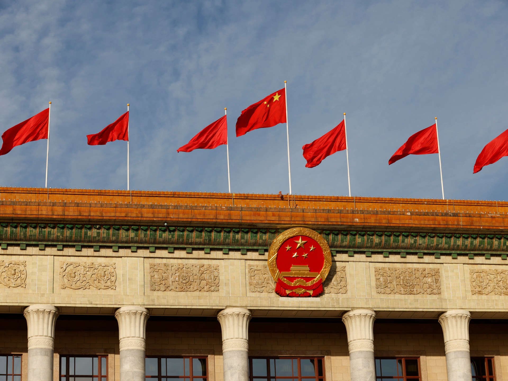 US government employee barred from leaving China, Washington says | News