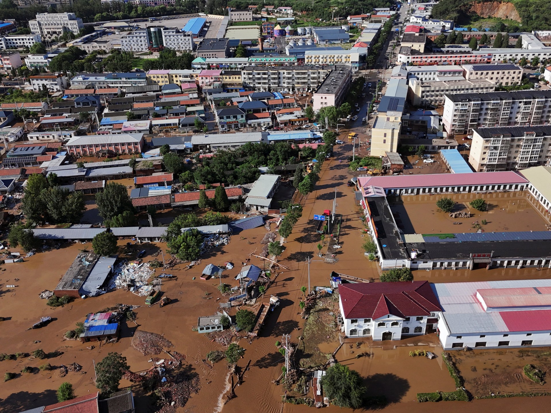 China flooding kills dozens, including 31 trapped at elderly care home | Floods News