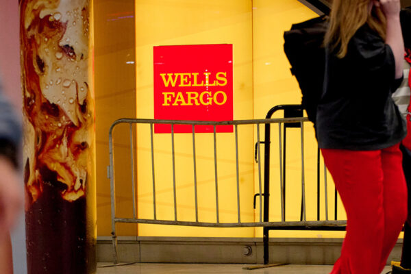 China says Wells Fargo banker under exit ban is involved in a criminal case