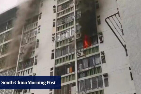 Man dies after fall from building during ‘suspicious’ blaze in Hong Kong Man dies after fall from building during ‘suspicious’ blaze in Hong Kong