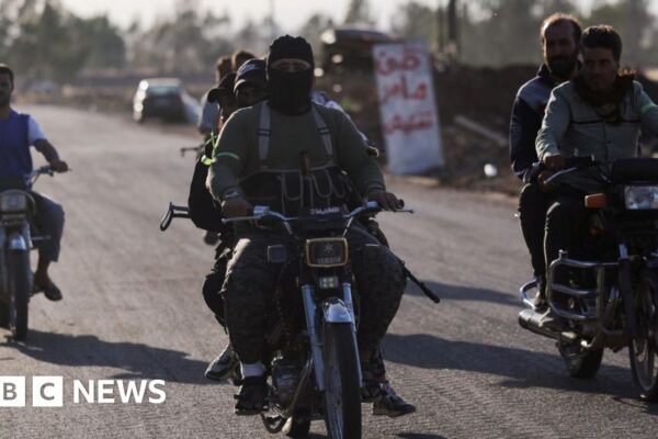 Almost 600 killed in south Syria violence, monitoring group says