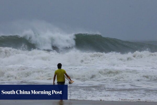 Hong Kong surfing coach slammed after claiming he’s riding waves during Typhoon Wipha