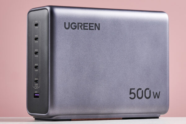 UGreen Nexode 500W 6-Port Charger against pink background