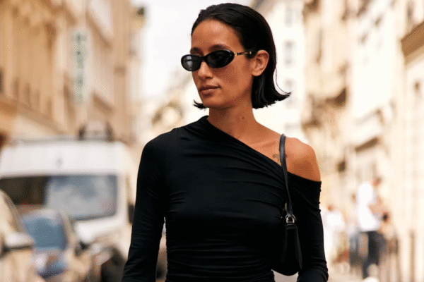woman wearing a black off-the-shoulder top in New York