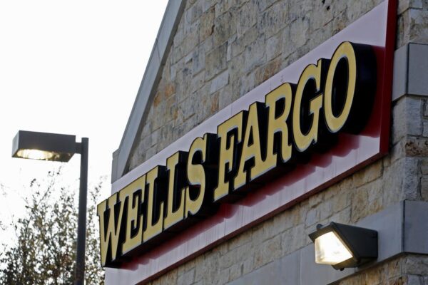 China imposes exit bans on Wells Fargo banker, U.S. government worker