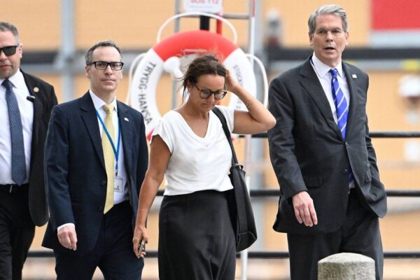 U.S. treasury secretary Scott Bessent, right, walks outside Rosenbad ahead of trade talks between the U.S. and China in Stockholm, Sweden, Tuesday July 29, 2025. (Fredrik Sandberg/TT News Agency via AP)
