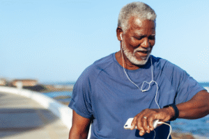Older man looking at fitness tracker