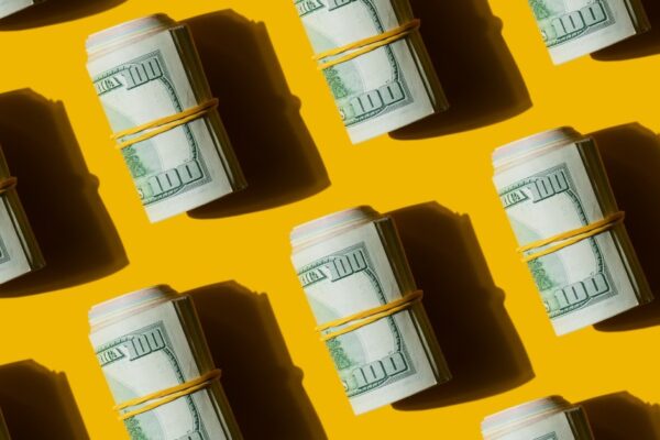 Abstract Pop Art Pattern of American dollars banknote bills on the yellow background