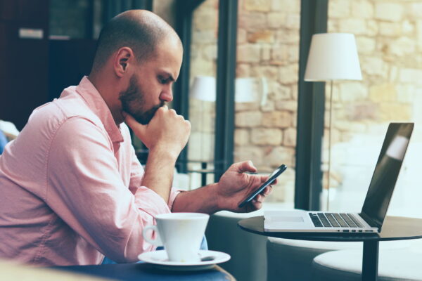 Man looking at smartphone