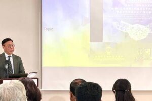Deputy Secretary for Justice Highlights Hong Kong's Role in Global Corporate Restructuring at International Symposium