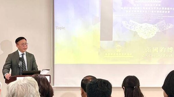 Deputy Secretary for Justice Highlights Hong Kong's Role in Global Corporate Restructuring at International Symposium