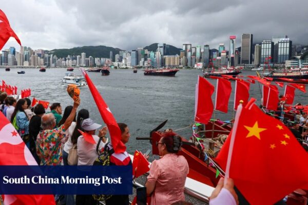 Hong Kong residents and tourists revel in handover anniversary festivities