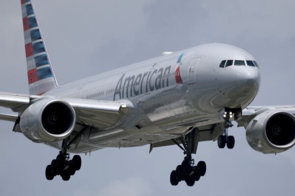 Passengers exit plane via emergency slide after aborted takeoff