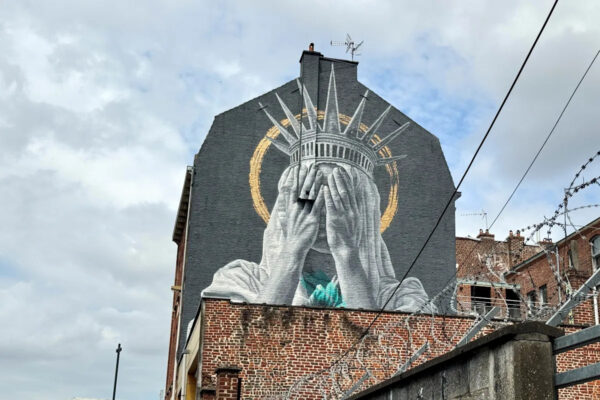 A new mural in France shows the Statue of Liberty covering her eyes in a swipe at Trump Yahoo news home