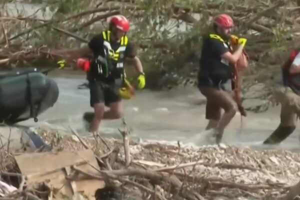 Texas flood rescue crews navigate tough terrain to search for missing