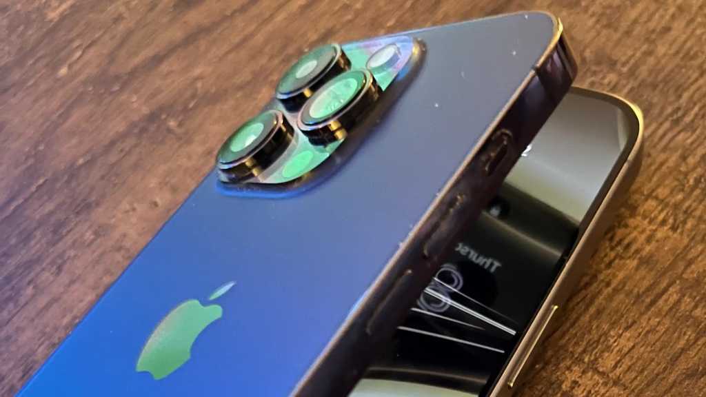 An image with two iPhones made to look like they're folding